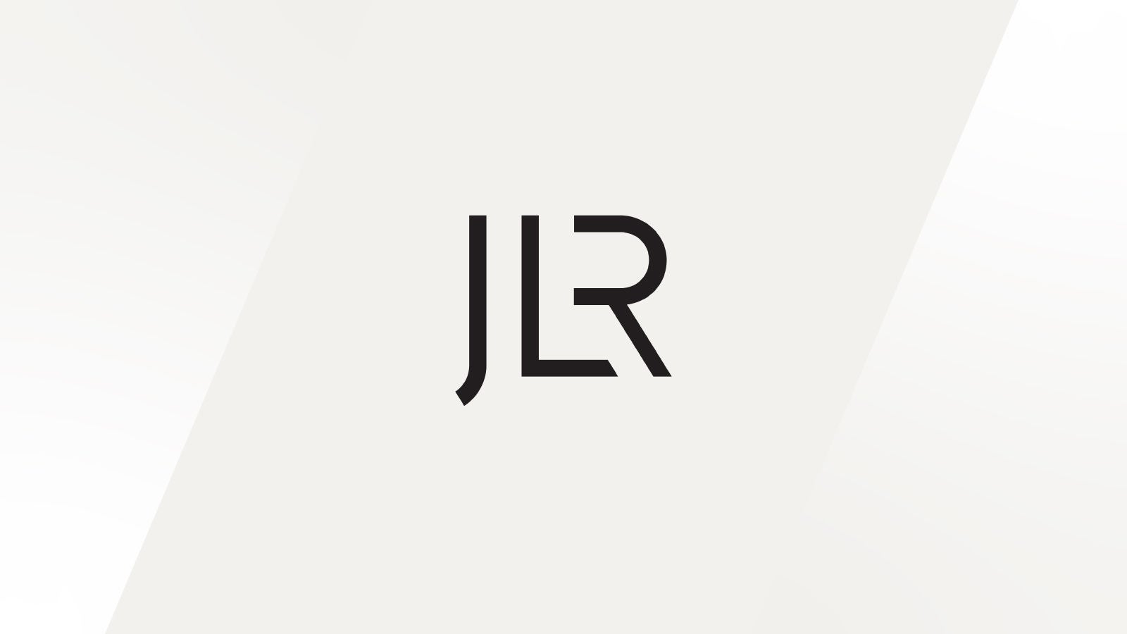JLR logo displayed center. Modern black “JLR” initials on a minimal off-white background with faint diagonal bands.