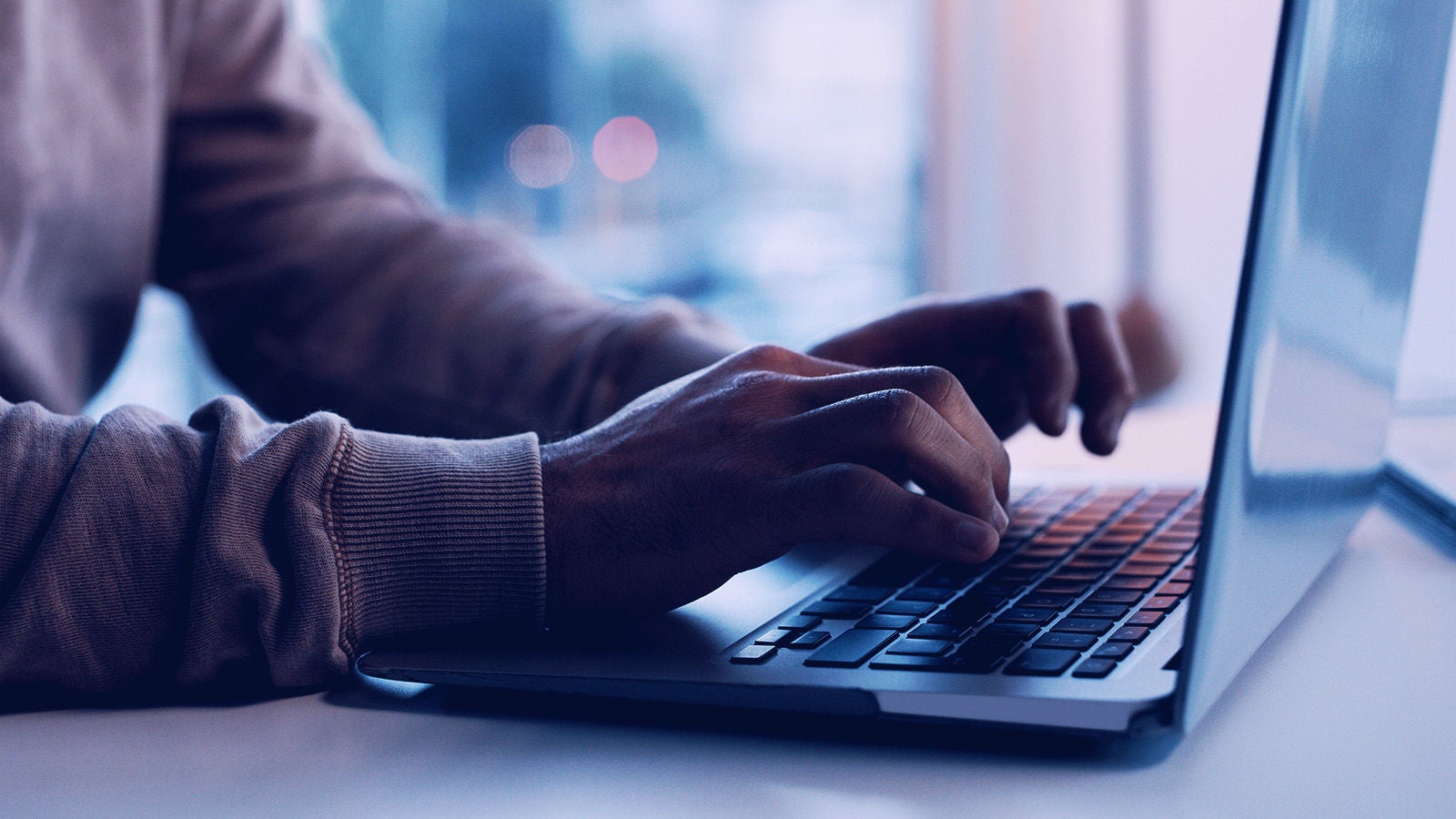 Business professional working on laptop