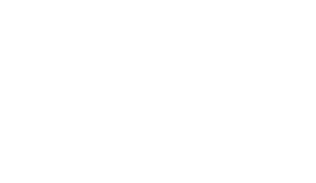 Cast iron cookware moving through a conveyor system