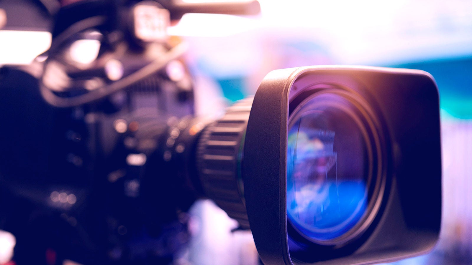 Man working on the inside of a machine/computer