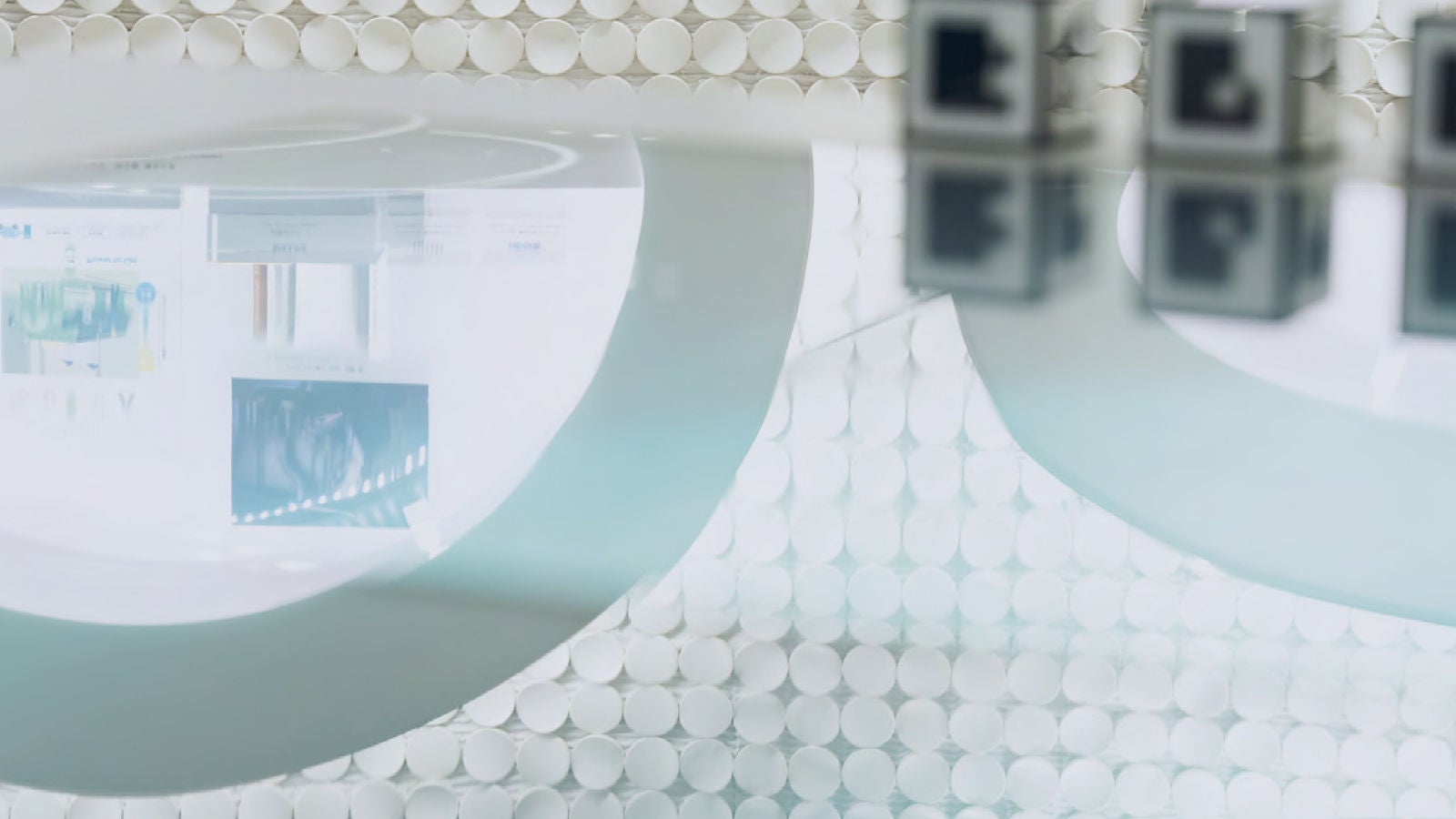 A reflection of a wall and ceiling