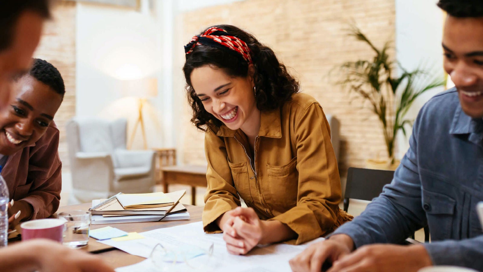 Outreach employees smiling in the office