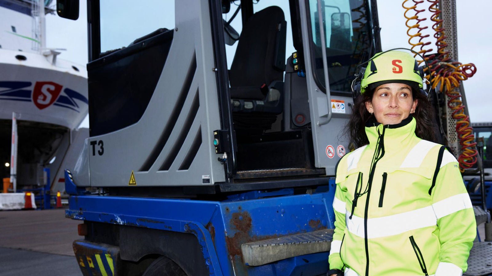 Woman wearing reflective gear on a job site