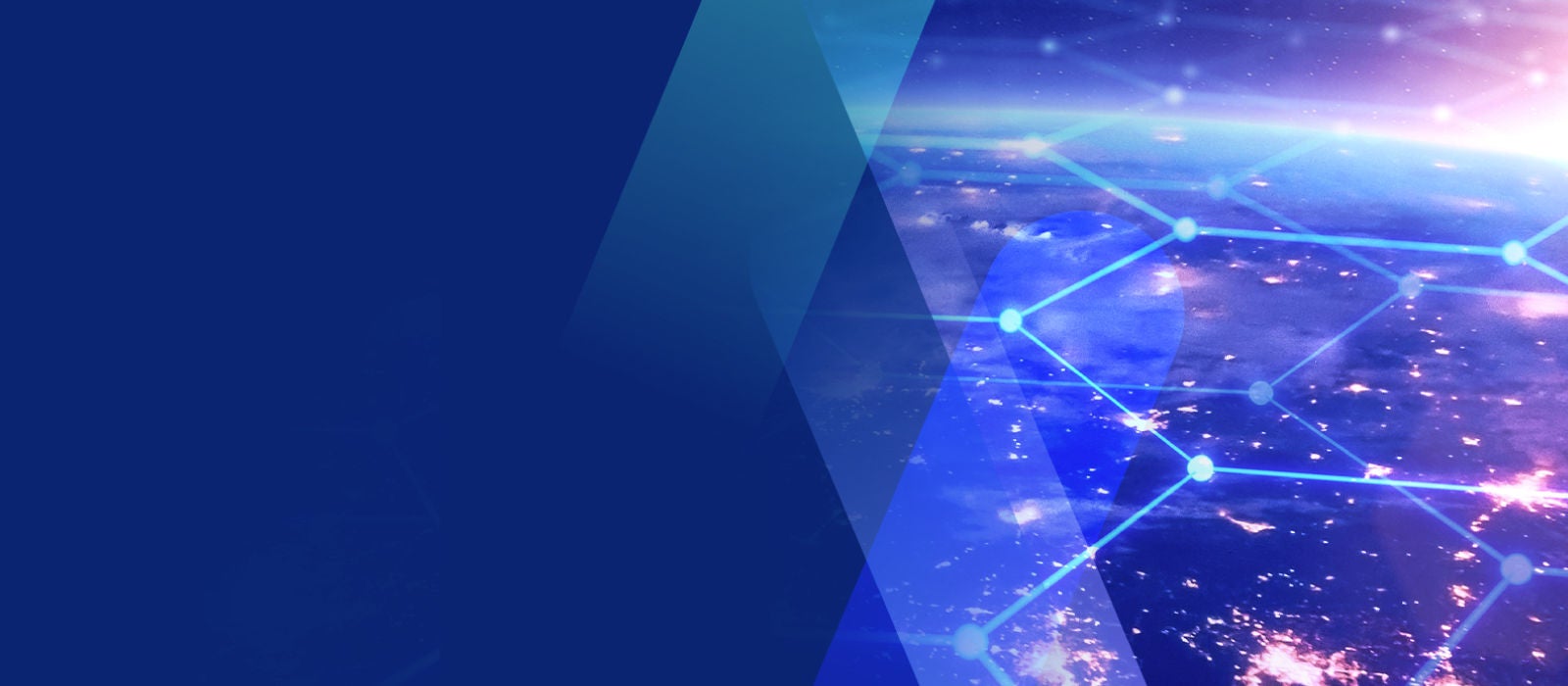 Man and woman laughing working together on computer