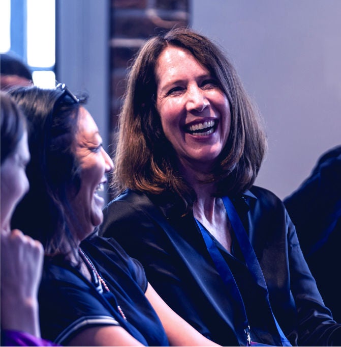 Woman smiling at Connect event