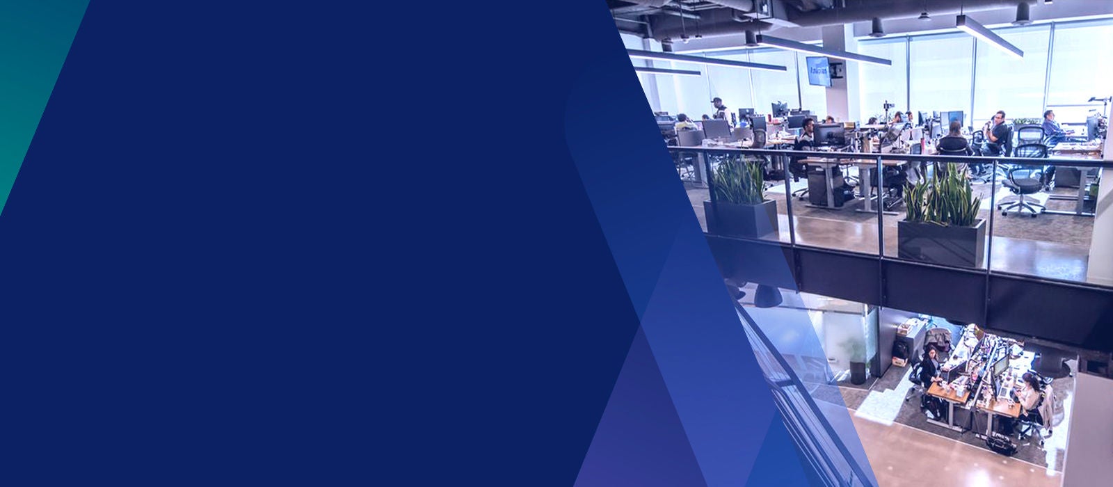 Woman in office typing at desk