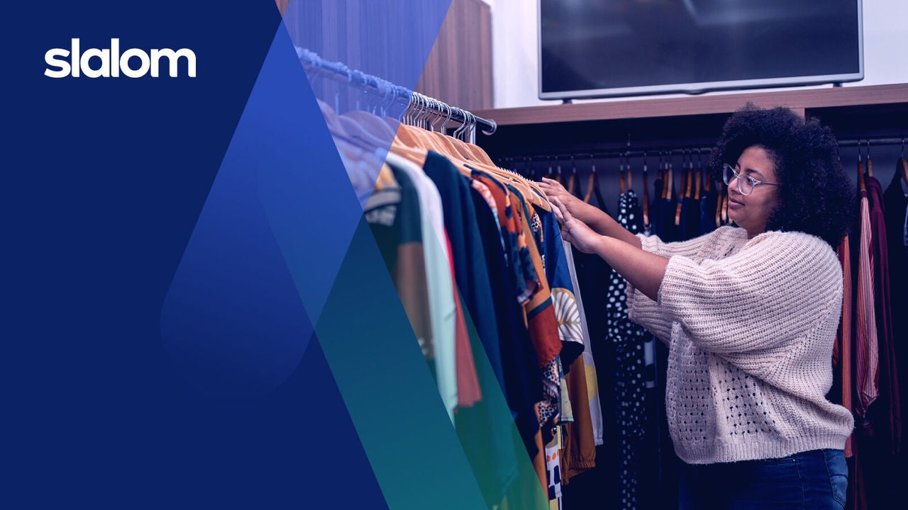 Graphic: woman wearing glasses and off-white sweater shopping for sweaters