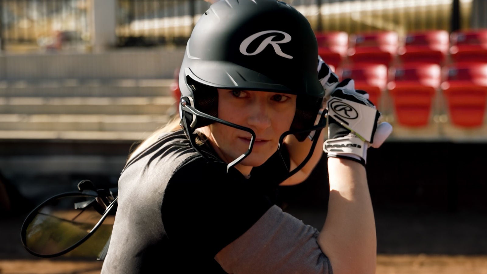 Person playing baseball up to bat