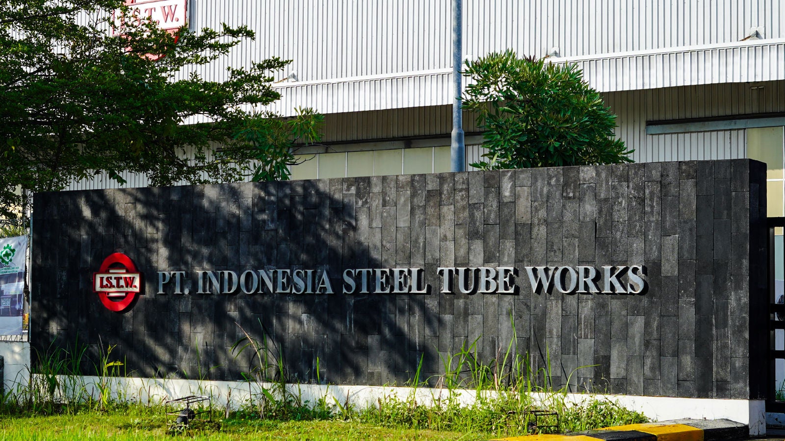 Indonesia Steel Tube Works Company sign