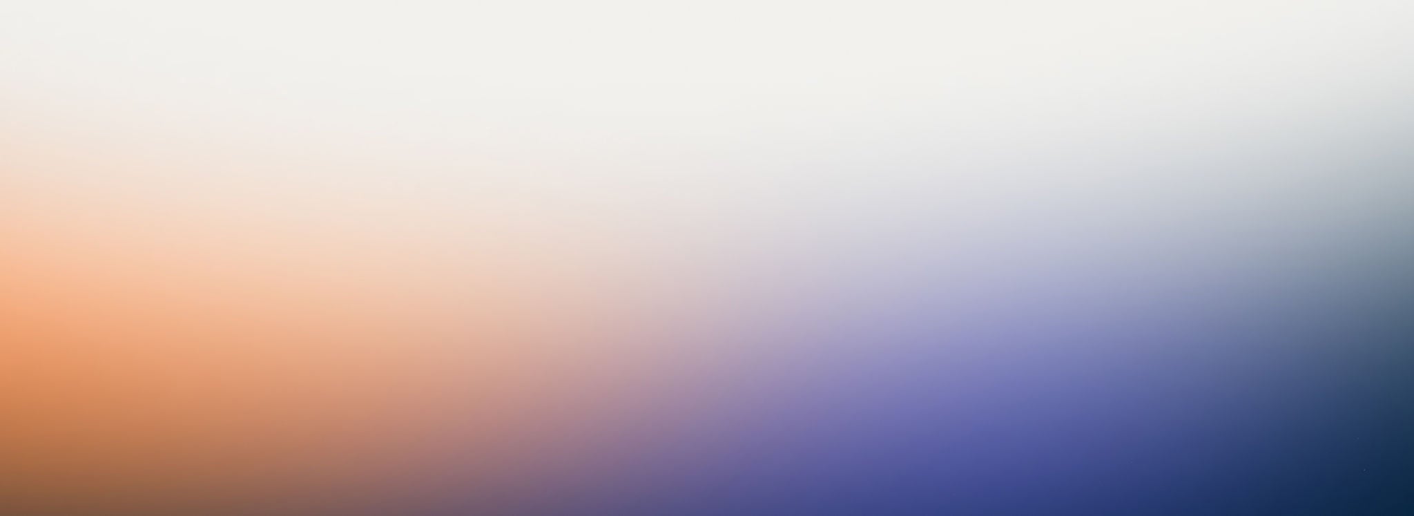 Warm Orange To Cool Blue Gradient Background
