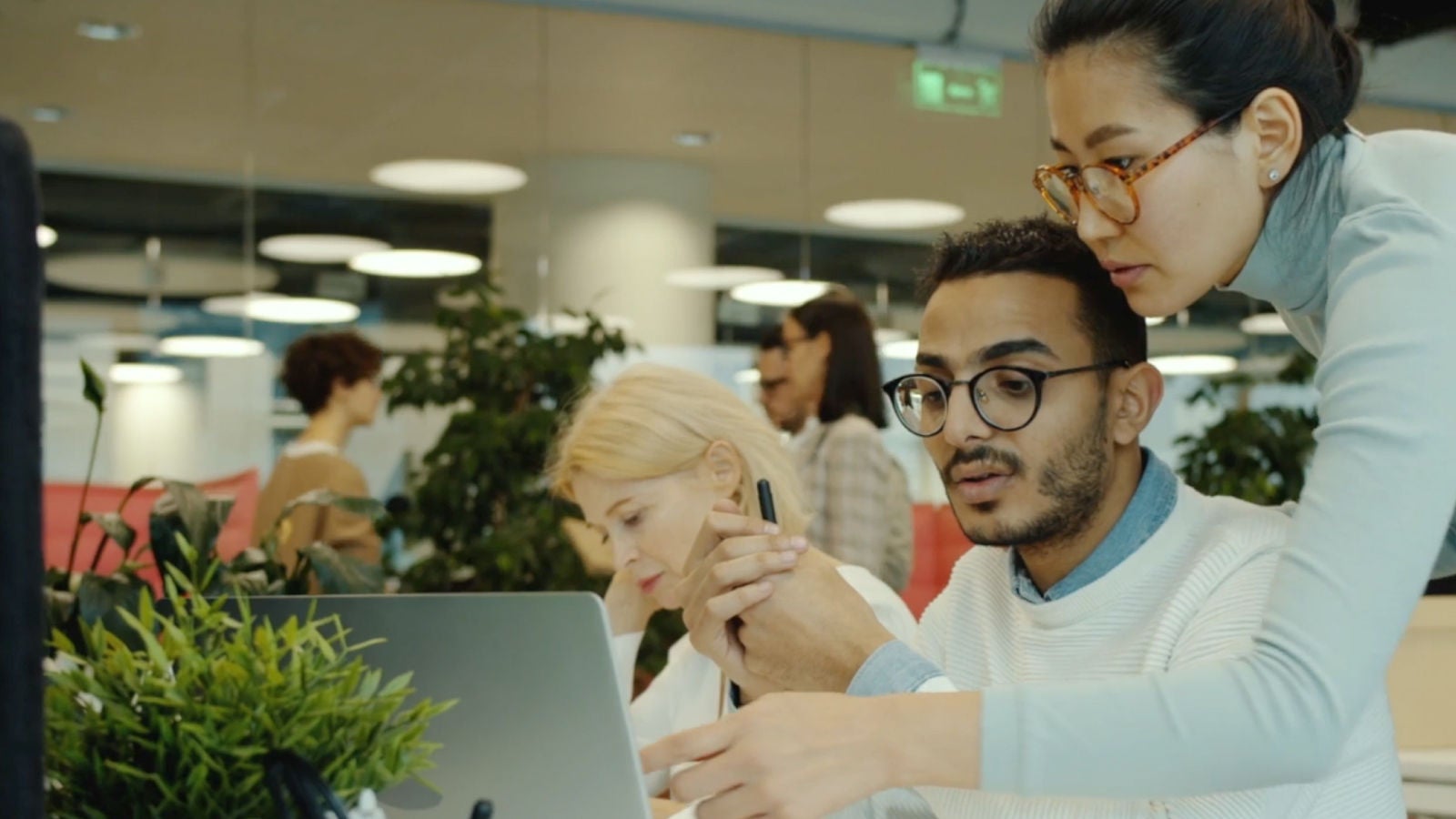 Knowledge sharing with colleagues in AXA office