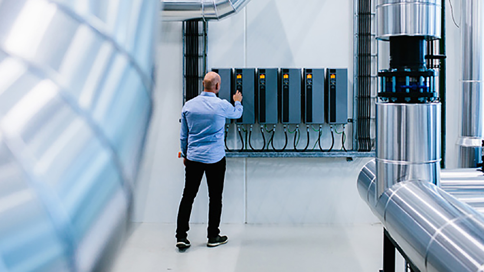  Man inspecting an energy panel