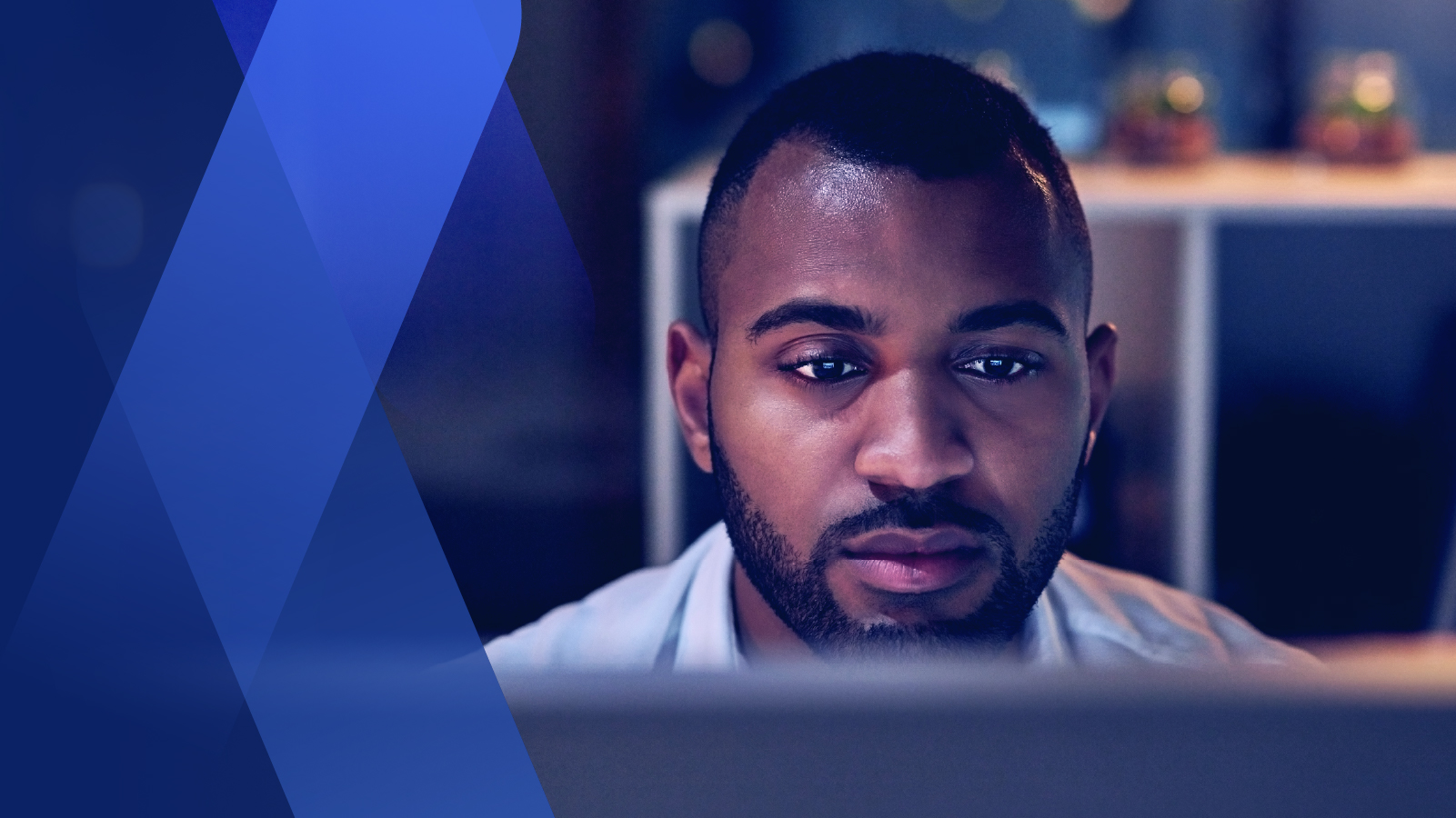 Graphic: abstract art overlayed man looking at computer