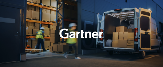 Warehouse workers stocking a van full of boxes with the Gartner logo overlayed atop