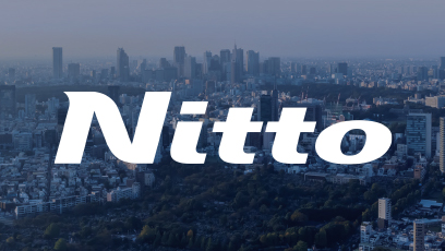Graphic: Nitto logo over shot of Tokyo